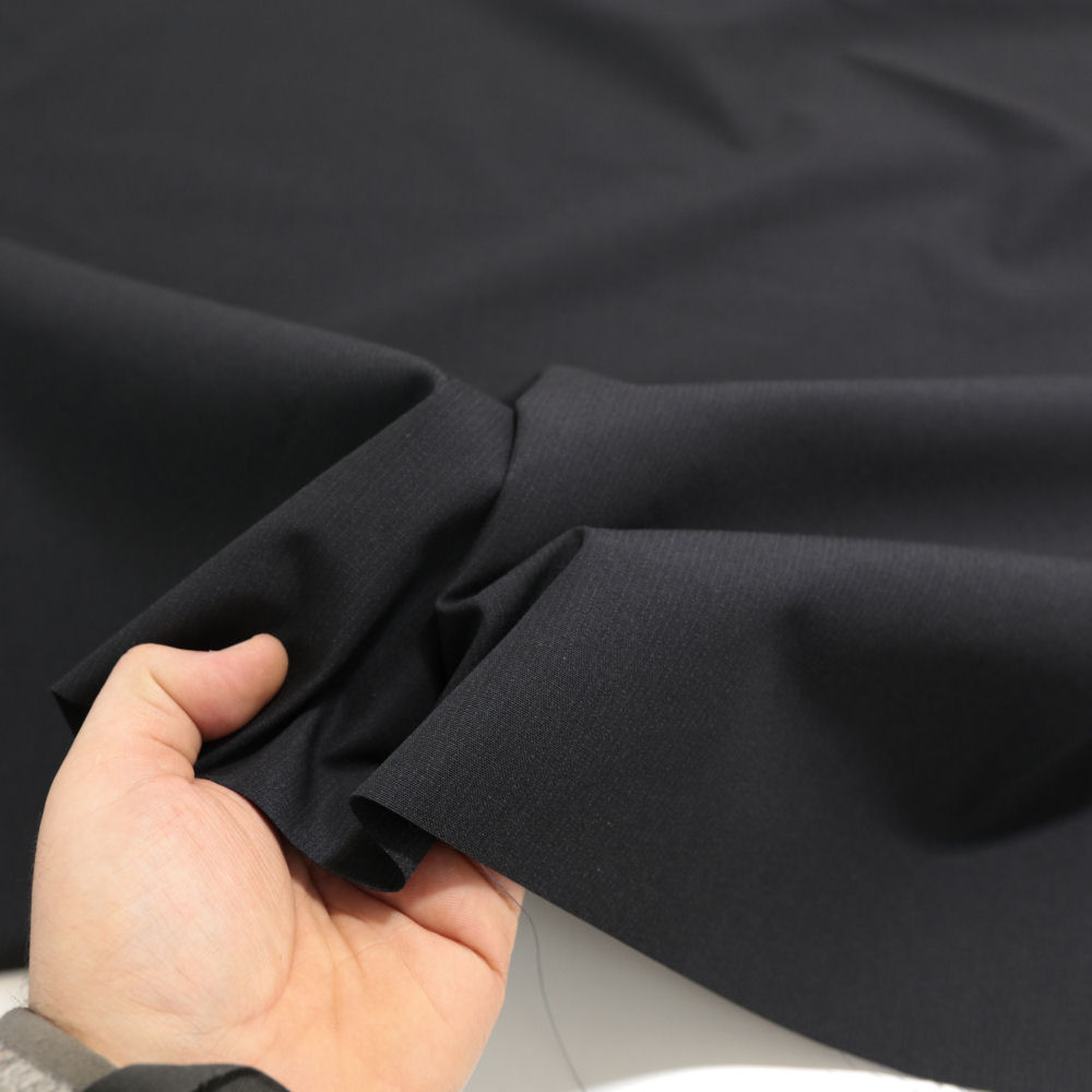 Designer Woll-Stoff Sakko Stoff knitterarm Meterware schwarz Winterstoff Designer Woll-Stoff Sakko Stoff knitterarm Meterware schwarz Winterstoff