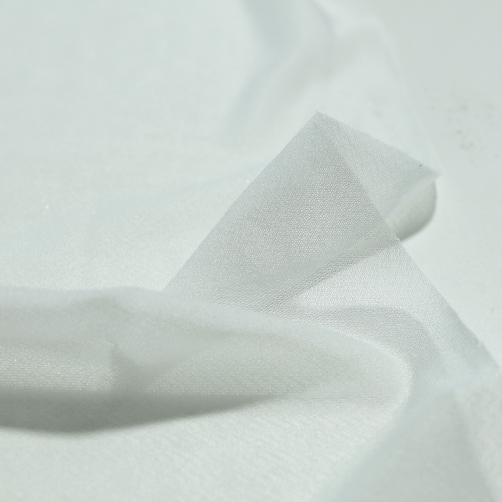 Bügel-Vlies in Weiß mit ohne Glanz in Überbreite Bügelstoff Bi-Elastisch